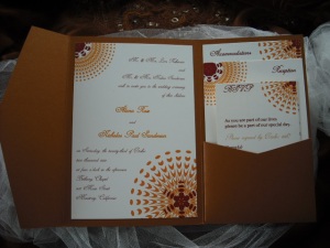 Sassy Sunburst Wedding Invitation in Copper, Orange and Burgundy